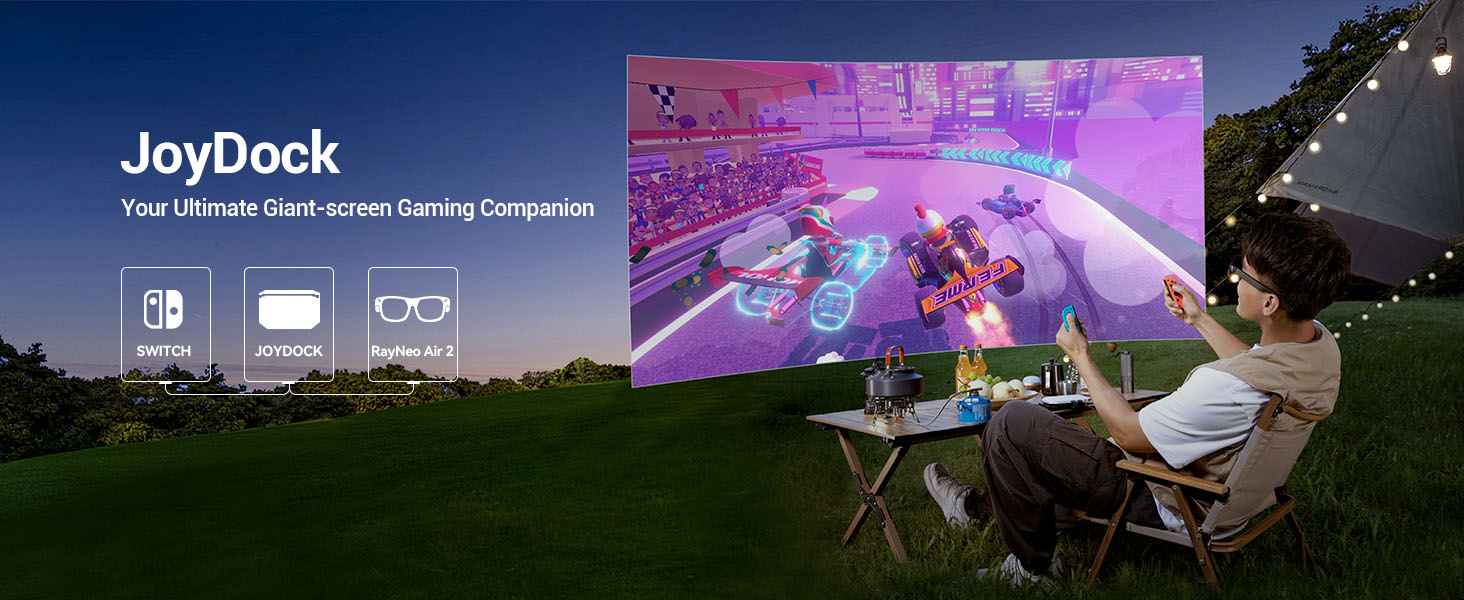 Man using RayNeo Air 2 glasses and JoyDock adapter for giant-screen Switch gaming outdoors.